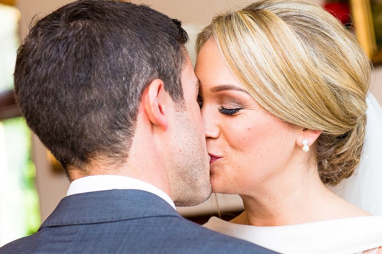 Stanhill Court Wedding Photographer - Bride and groom kiss