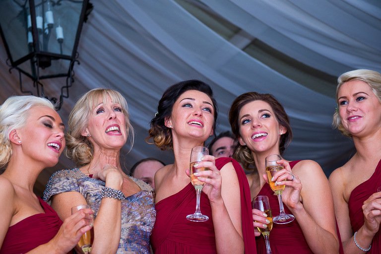 Stanhill Court Wedding Photographer - mum and bridesmaids watch first dance