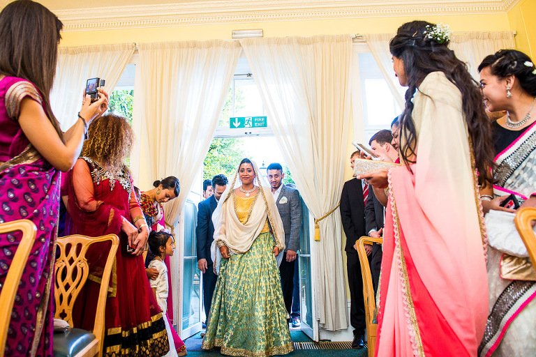 Bride enters The Admiral's Suite on her wedding day