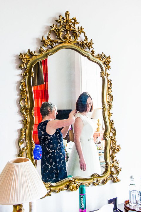  Dovecliff Hall Hotel Wedding Photographer- Bride in the mirror