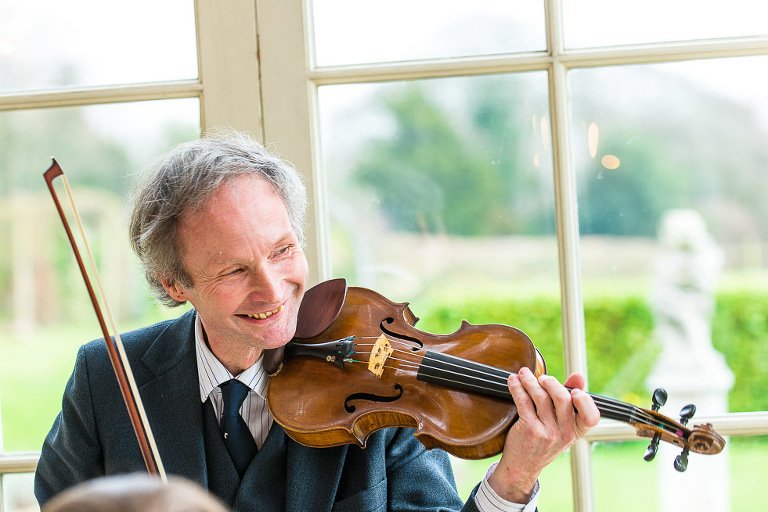 Violinist plays in wedding ceremony