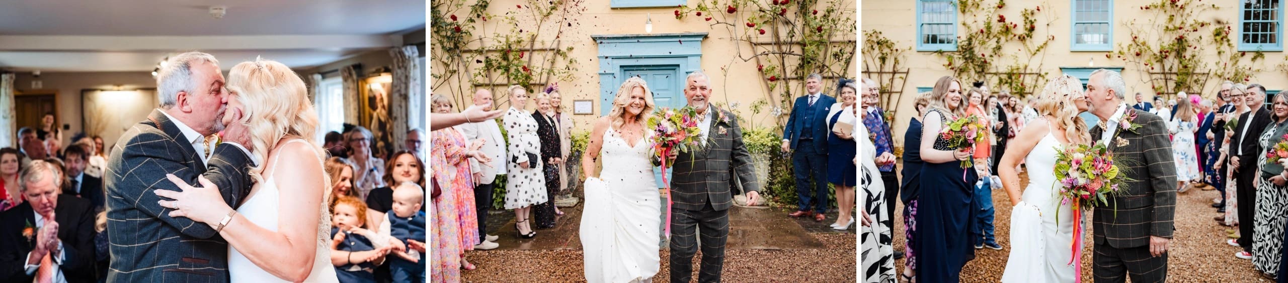 Bride and groom kiss while surrounded by guests at their reception celebration. — Wedding at South Farm, Cambridgeshire