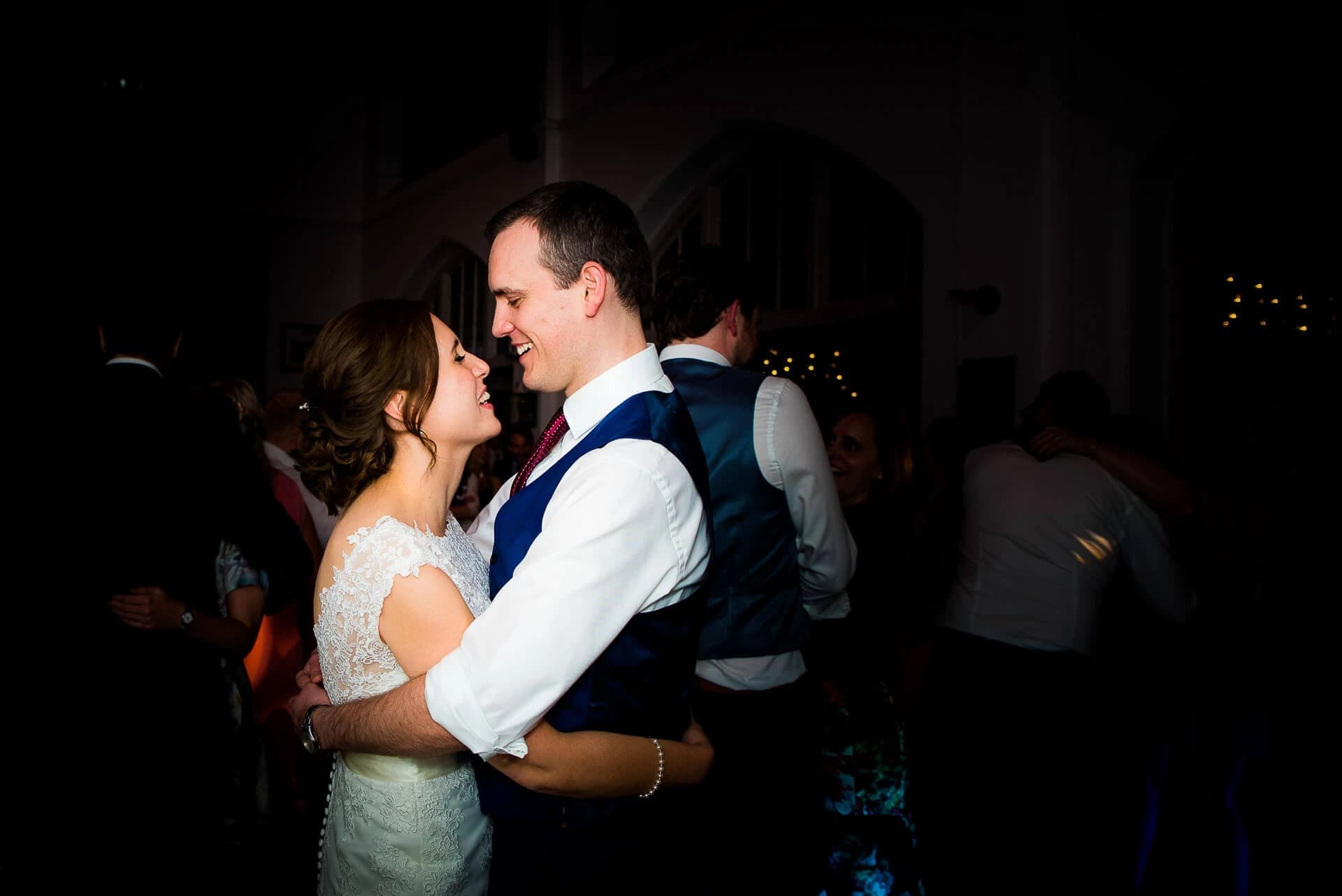 Bride and groom dancing together during reception, faces close, intimate moment. — Wedding at The Lodge Hotel Putney, London