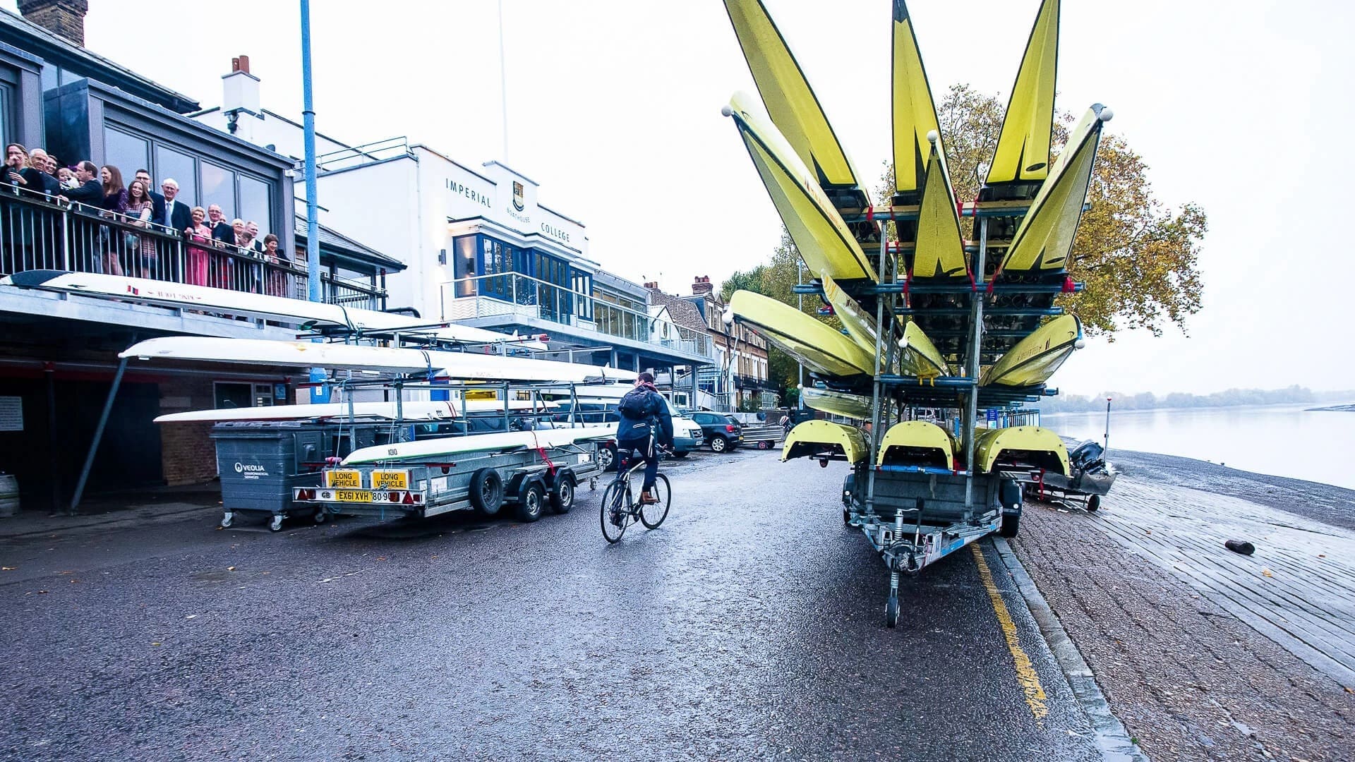Yellow winged art installation parked on waterfront promenade beside pedestrians and bicycles. — Wedding at The Lodge Hotel Putney, London